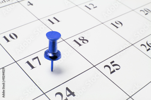 Blue Thumb Tack on Calendar