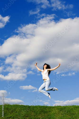 pretty young woman is jumping