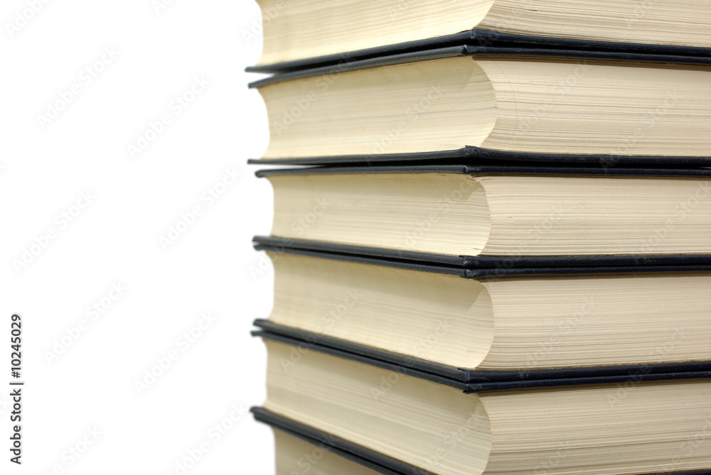 Tall Stack of Hardcover Books with Black Binding on Pure White Background - Educational Literature and Academic Study Materials for University Students and Library Collection Tall Stack of Hardcover Books with Black Binding on Pure White Background - Educational Literature and Academic Study Materials for University Students and Library Collection