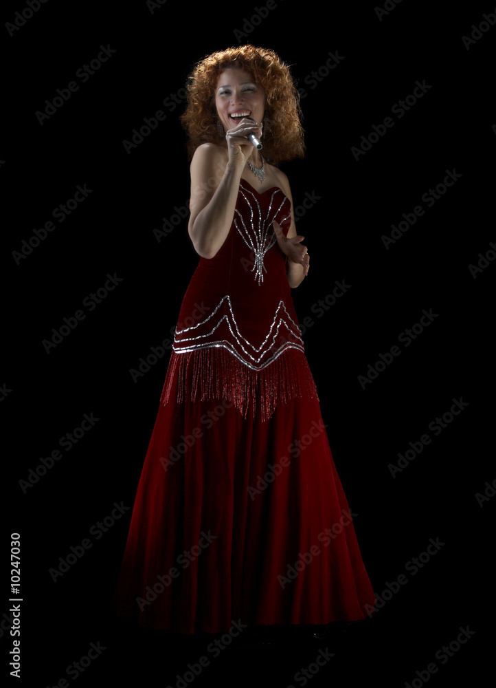 The beautiful singer on a black background The beautiful singer on a black background