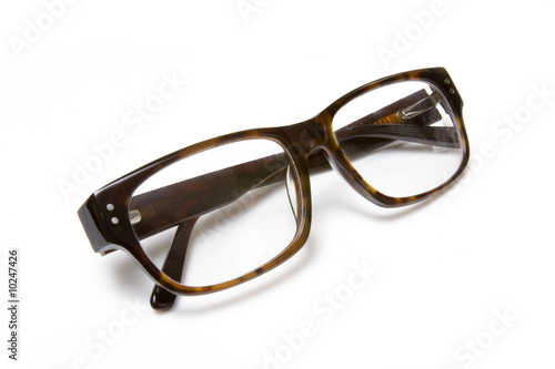 Mens glasses isolated on a white studio background