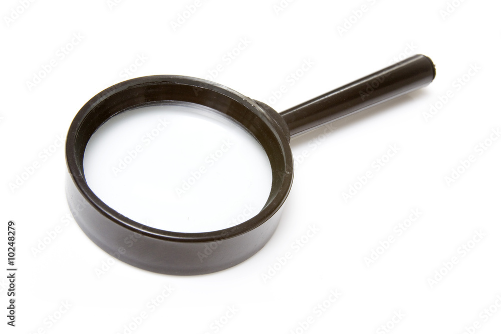 Magnifying glass isolated on a white studio background Magnifying glass isolated on a white studio background