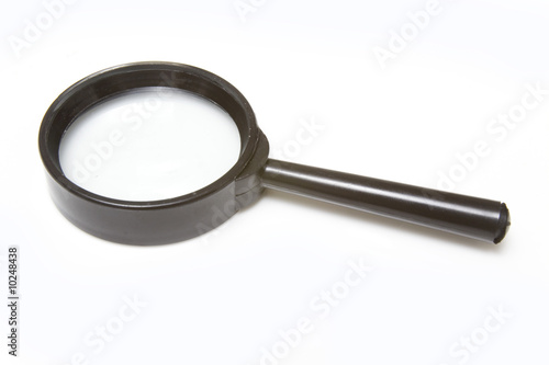 Magnifying glass isolated on a white studio background