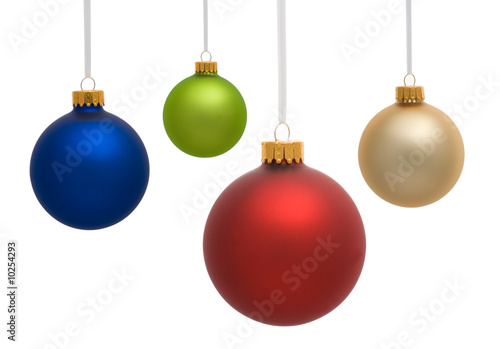 Four Christmas ornaments on white background