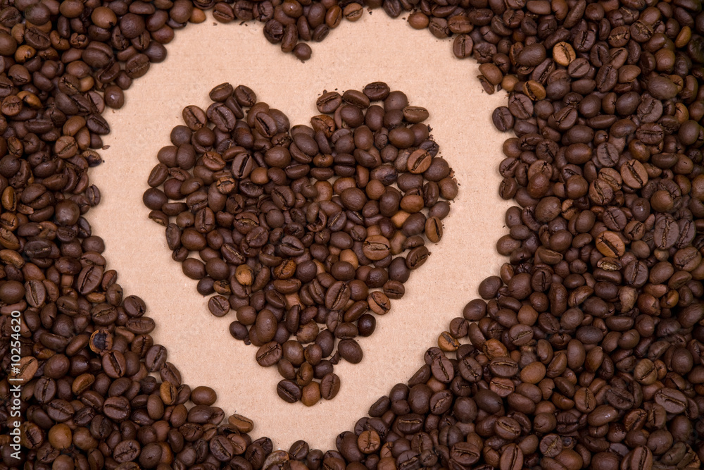 heart shape background made with coffee beans heart shape background made with coffee beans