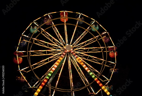 Ferris wheel. Night entertainment.