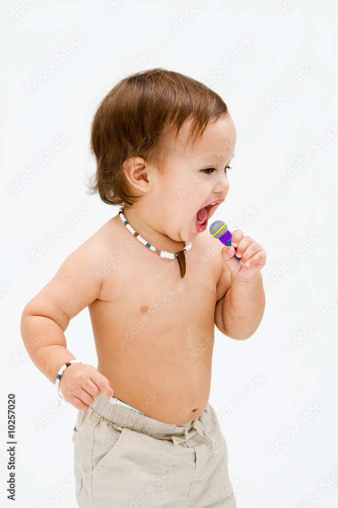 Cute topless toddler boy with open mouth singing, isolated Cute topless toddler boy with open mouth singing, isolated