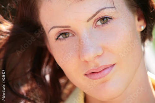close-up portrait of the attractive girl with green eyes