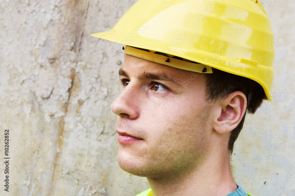Head portrait of young construction worker Head portrait of young construction worker
