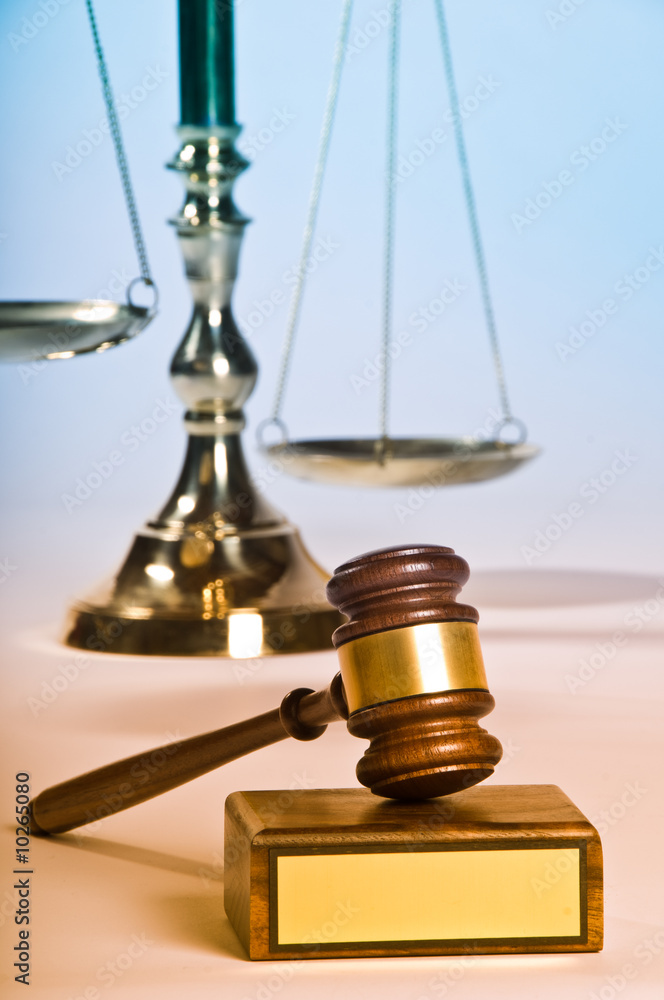 Wooden justice gavel and block with brass Wooden justice gavel and block with brass