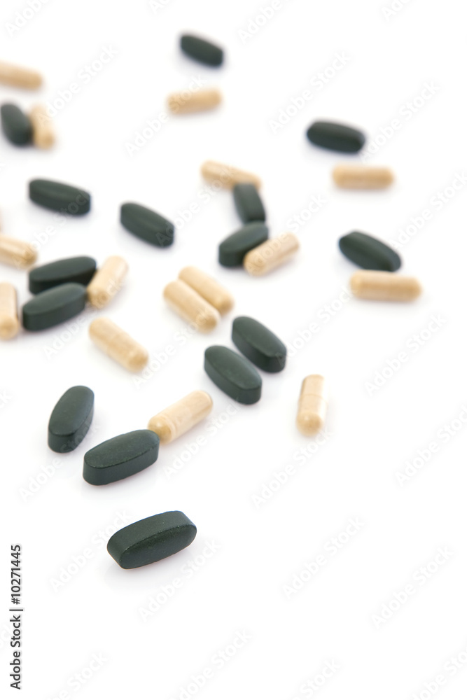 medical pills close up on white background with shallow dof medical pills close up on white background with shallow dof