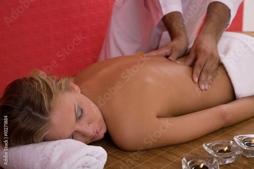 beauty concept with a woman having a massage therapy at the spa