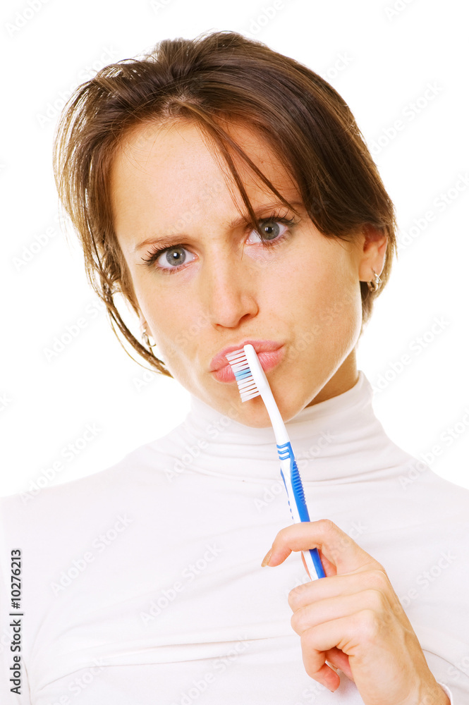 woman with toothbrush thinking. isolated on white woman with toothbrush thinking. isolated on white