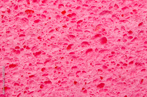 Pink sponge closeup as background texture