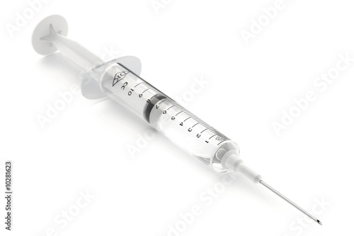 Medical syringe isolated over a white background. photo