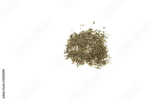 Dried Thyme spread out on a white background