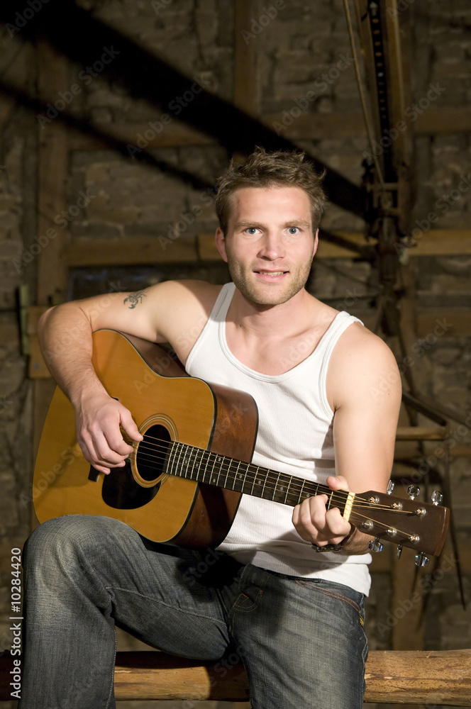 Obraz premium Mann mit Gitarre