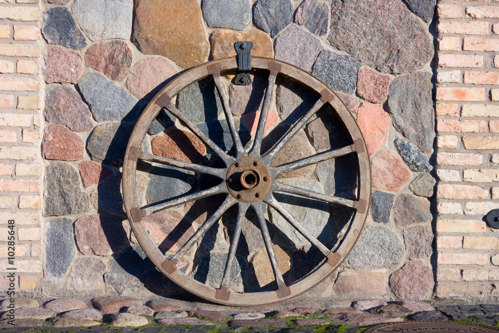 wagon wheel on wall