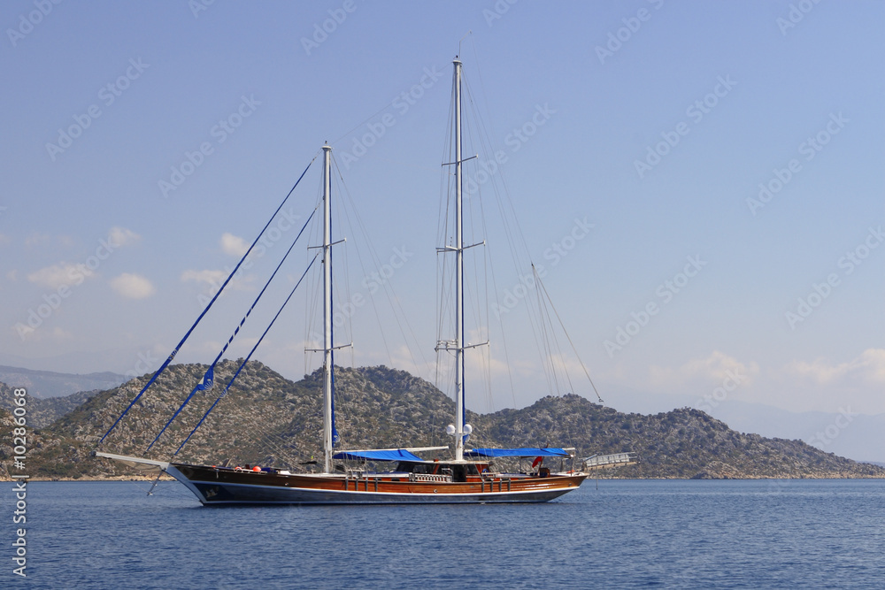 Sailboat without sail in the bay. White Sea.