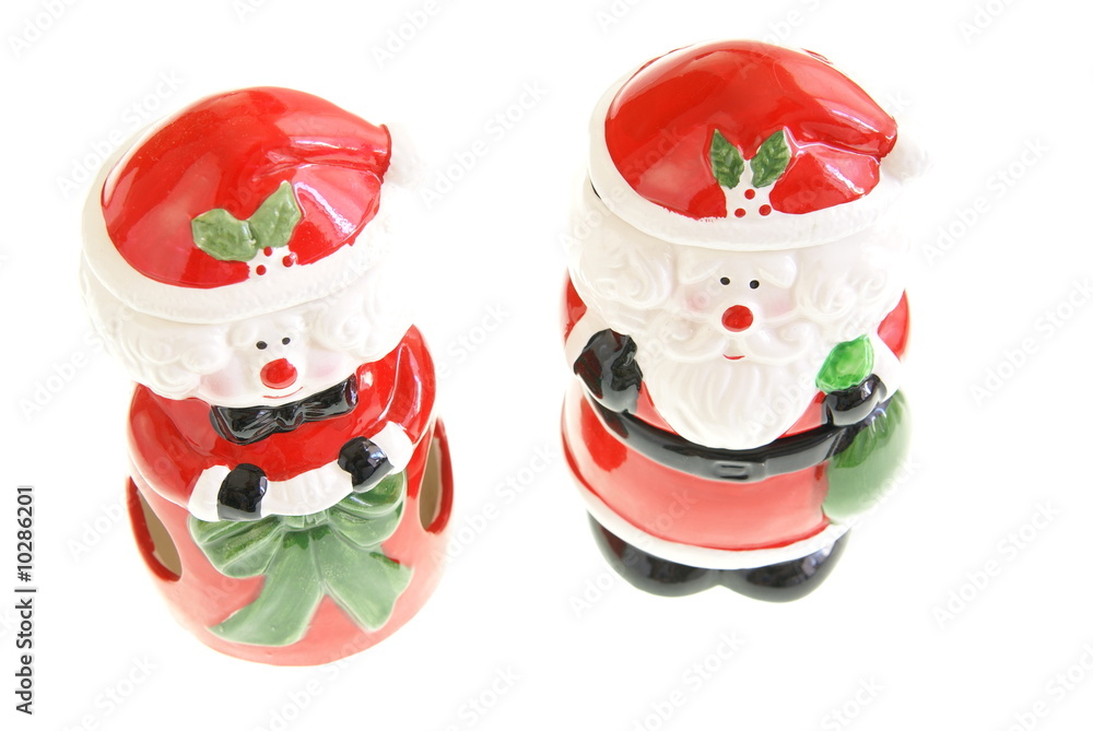Santa and Mrs Claus figurines on white