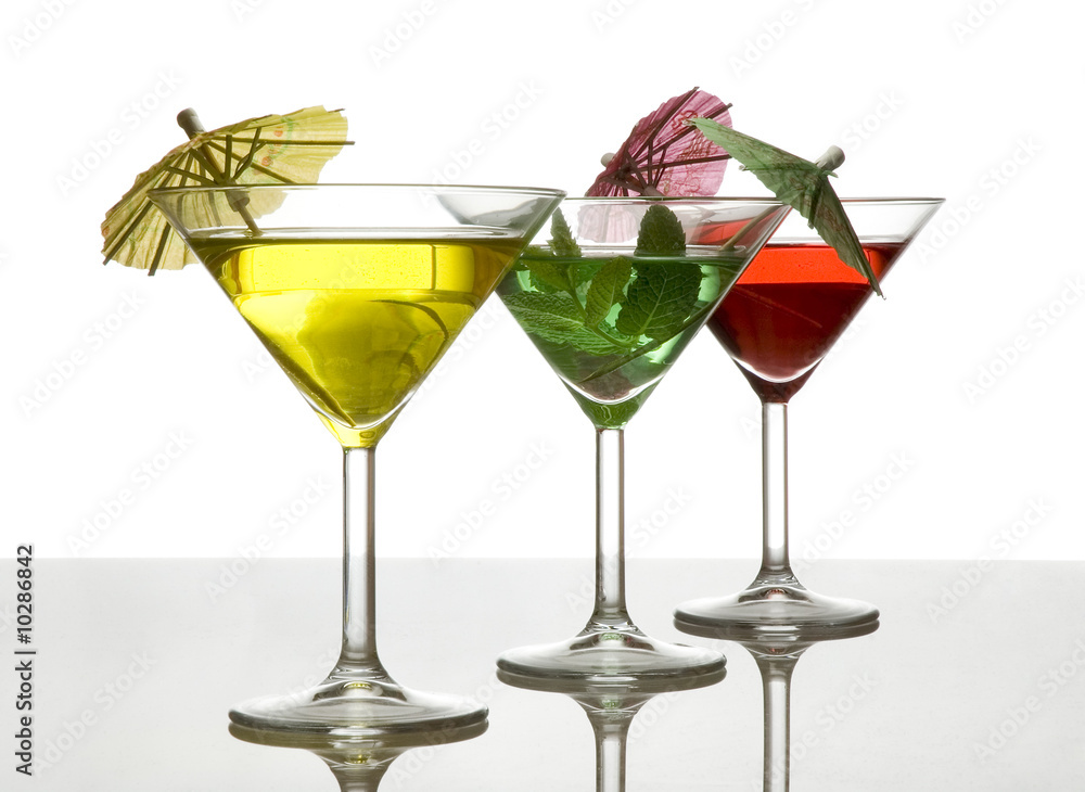 three cocktails with umbrella isolated on white three cocktails with umbrella isolated on white
