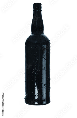 Bottle and drops of a condensate on a white  background
