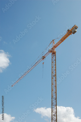 Building crane on the sky background