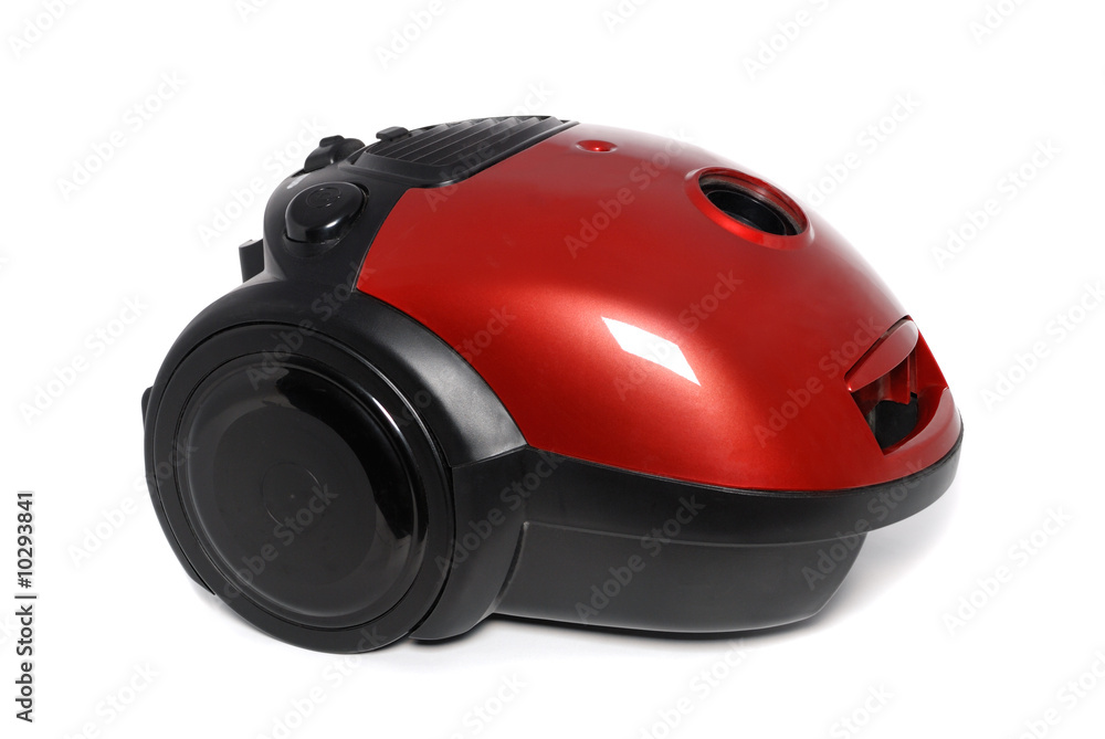New small red vacuum cleaner isolated on the white New small red vacuum cleaner isolated on the white