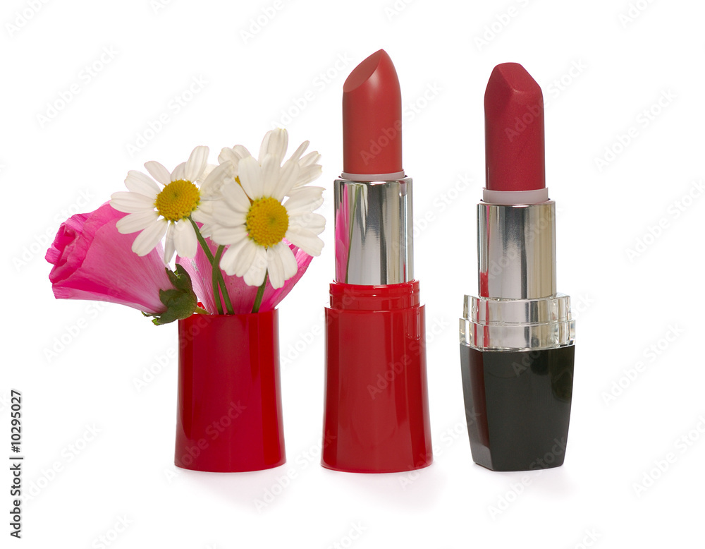open tube of red lipstick on white background open tube of red lipstick on white background