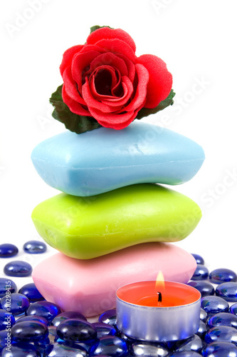Colourful soap bars and aroma rose  on a white background