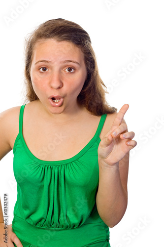 Cute girl wagging her finger and disapproving of something