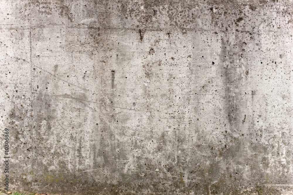 Eine graue Mauer aus Beton für Hintergrund