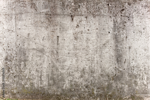 Eine graue Mauer aus Beton für Hintergrund