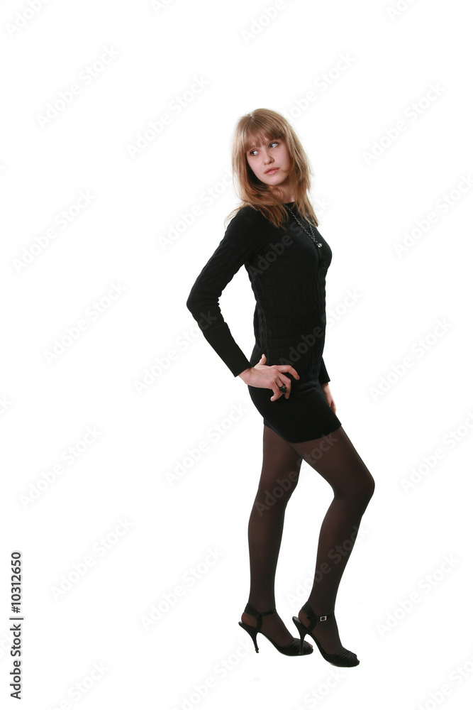 Fototapeta premium The young woman poses on a white background