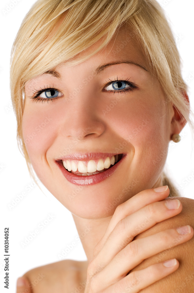 Young blonde woman with blue eyes close up