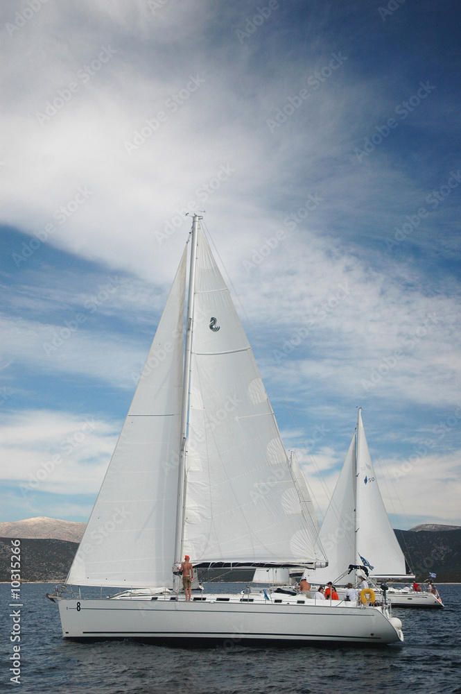 Obraz premium two white yacht sail in the greece