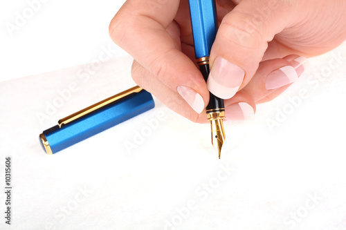 Photo Close-up of a fountain pen isolated over a white background..