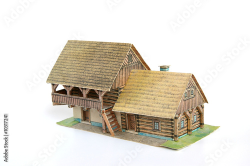 Small model of cottage made of paper