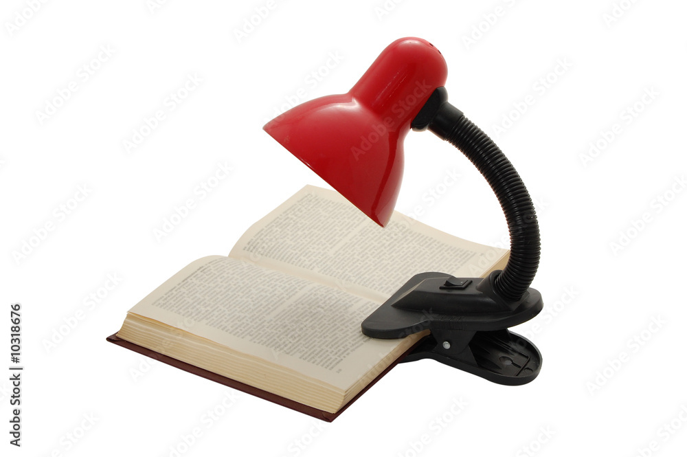 desk lamp and book isolated on a white desk lamp and book isolated on a white