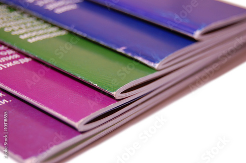 Stack of colourful magazines