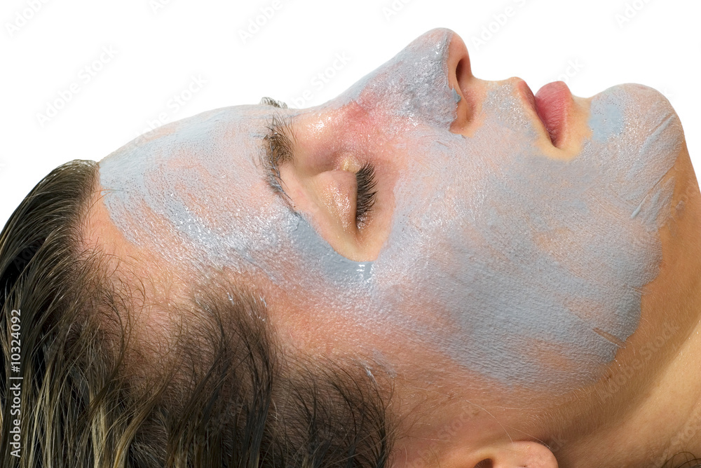 Naklejka premium Closeup of the female face with a skin mask