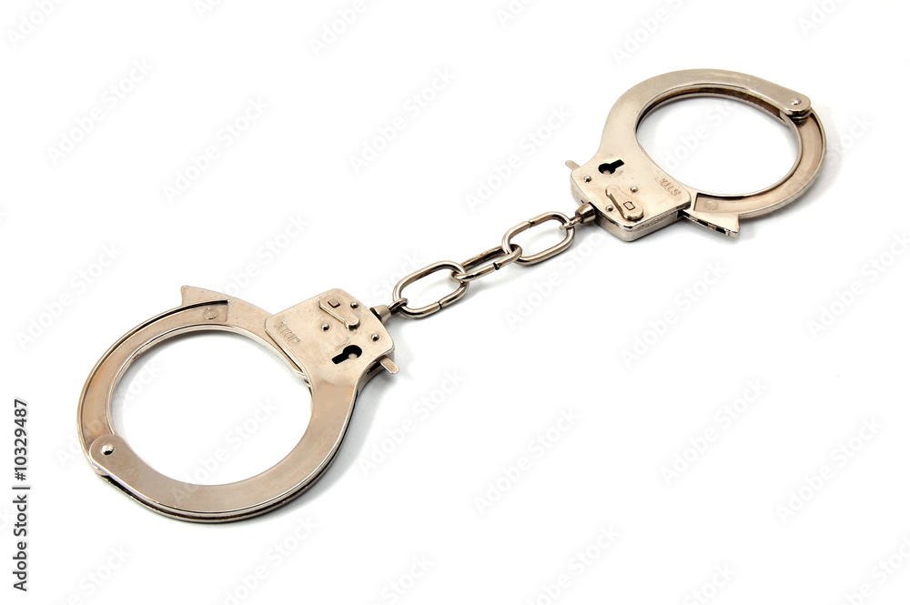 police handcuffs isolated on a white background police handcuffs isolated on a white background