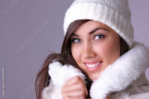 beautiful young woman in coat.