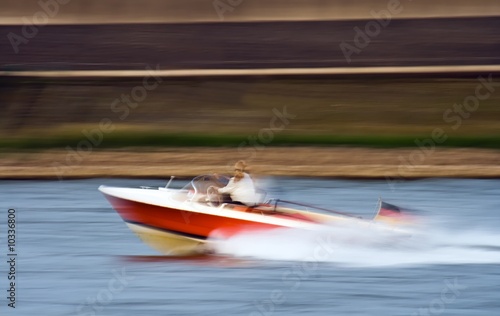 Panning shot of motorboat