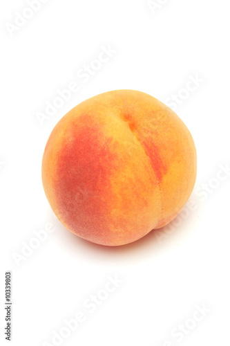 Fresh peach isolated on white.