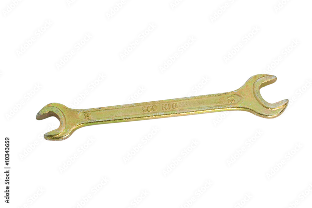 Brass spanner isolated over white Brass spanner isolated over white