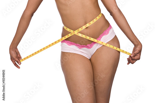 african woman with a tape measure, diet concept