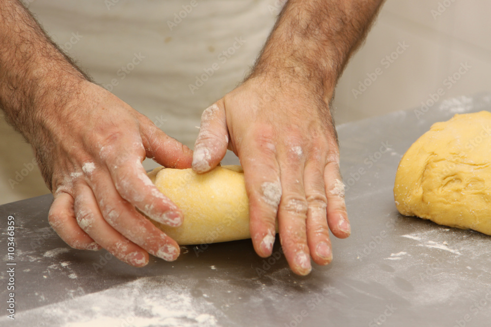 baker who works the paste in a french bakery baker who works the paste in a french bakery