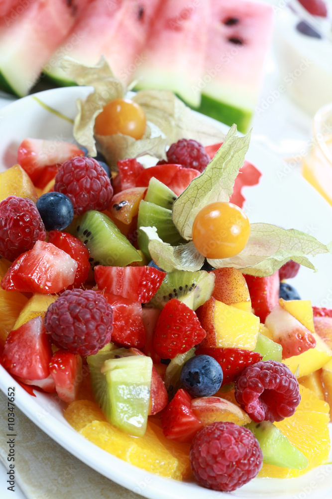 Delicious fruit salad with fresh fruits and low calorie Delicious fruit salad with fresh fruits and low calorie