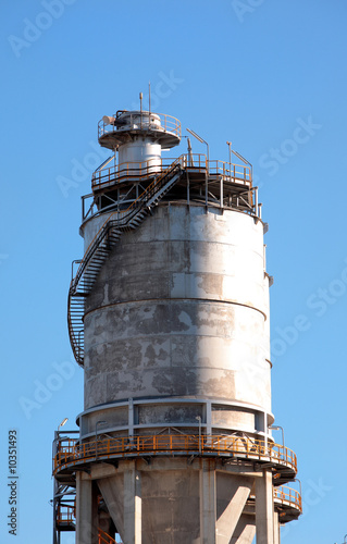 Large steel storage tower on Spanish industrial estate